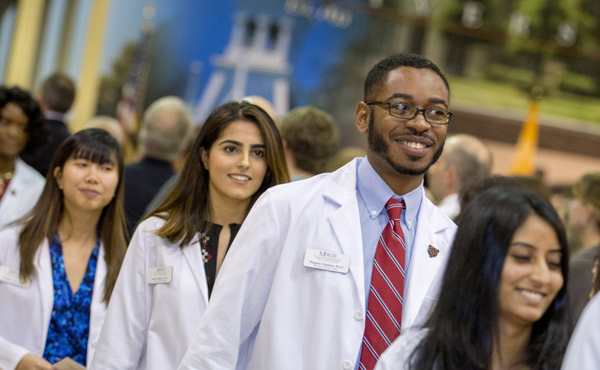 Students in white coats