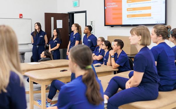 Students listening to someone teaching